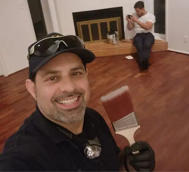 Rad Hacks smiling while painting